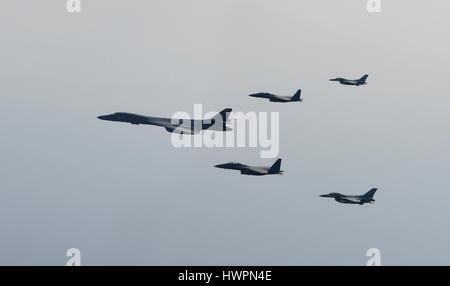 South Korea. 22nd March 2017. A U.S. Air Force B-1B Lancer bomber is escorted by Japanese and South Korean Air Force fighter jets during a joint mission March 22, 2017 over South Korea. The joint show of forces comes after the latest North Korean ballistic missile launch test ended in failure. Credit: Planetpix/Alamy Live News Stock Photo