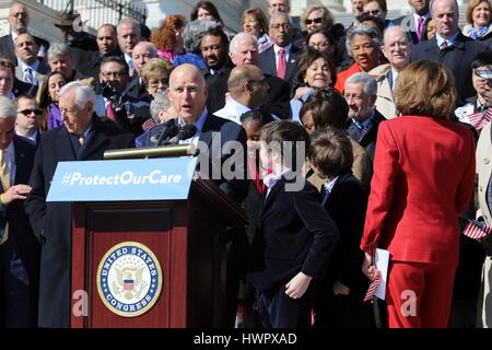 Washington, USA. 22nd Mar, 2017. California Gov. Jerry Brown joins Democrats during a rally marking the 7th anniversary of the  Affordable Care Act known as Obamacare on Capitol Hill March 22, 2017 in Washington, DC. Biden called the Republican health care proposal as a giveaway to the rich. Credit: Planetpix/Alamy Live News Stock Photo