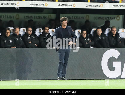 Dortmund, Germany. 22nd Mar, 2017. Germany's coach Joachim Loew looks on during an international friendly match between Germany and England in Dortmund, Germany, on March 22, 2017. Germany won 1-0 and Germany's Lukas Podolski retired from German national team after this match. Credit: Shan Yuqi/Xinhua/Alamy Live News Stock Photo