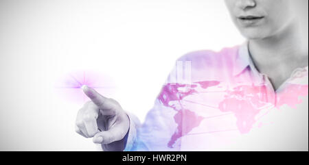 Businesswoman using imaginative digital screen against view of a global map 3d Stock Photo