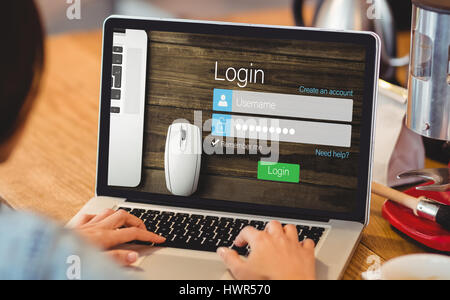 Close-up of login page against woman using laptop at office Stock Photo