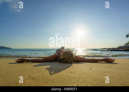 Woman on the beach in Surin Phuket Thailand Stock Photo