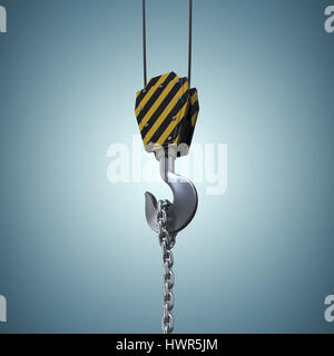 Studio Shoot of a crane lifting hook against grey vignette Stock Photo