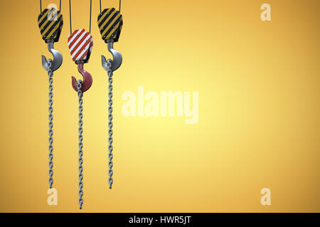 Studio Shoot of a crane lifting hook against yellow vignette Stock Photo