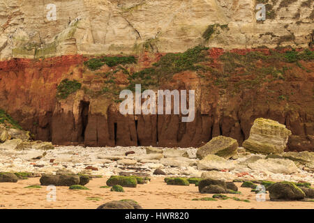 HUNSTANTON, ENGLAND - MARCH 10: White chalk and red sandstone cliffs, and beach at Hunstanton. In Hunstanton, Norfolk, England. On 10th March 2017. Stock Photo