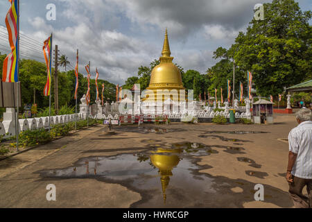 Golden Stupa at the Dambulla Cave Temple complex near Dambulla town in the Cultural Triangle in Sri Lanka. Stock Photo