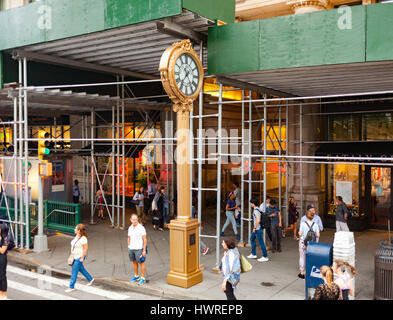 New York City, Usa - July 09, 2015: Landmark Fifth Avenue with golden clock in Manhattan. This historic clock in the Flatiron District dates back to 1 Stock Photo