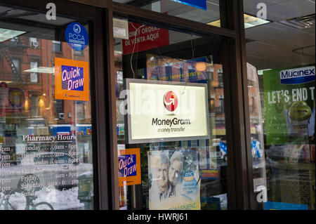 A store in New York offering MoneyGram services on Wednesday, March 15, 2017. After agreeing to be acquired by the Chinese Ant Financial Services, MoneyGram now has a bid by Kansas-based Euronet Worldwide for substantially more. (© Richard B. Levine) Stock Photo