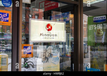 A store in New York offering MoneyGram services on Wednesday, March 15, 2017. After agreeing to be acquired by the Chinese Ant Financial Services, MoneyGram now has a bid by Kansas-based Euronet Worldwide for substantially more. (© Richard B. Levine) Stock Photo