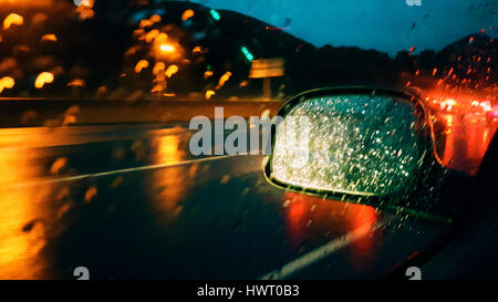 Rainy night through the car window Stock Photo - Alamy