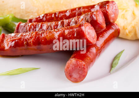 breakfast with omelet, asparagus and sausages. Stock Photo
