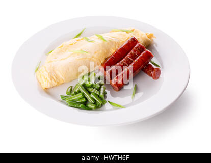 breakfast with omelet, asparagus and sausages. Stock Photo