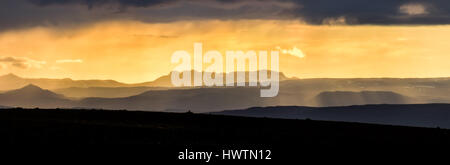 Colorful sunset over mountains. Fantastic view of icelandic landscape. Iceland. Stock Photo