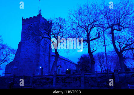 Old church at night under full moon Stock Photo