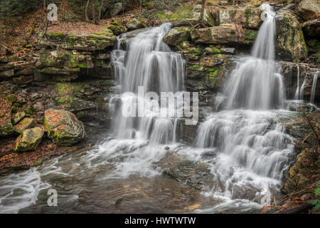 The waters of Marr Branch make a long descent, some 800 feet in total, carving its way down West Virginia's New River Gorge, West Virginia. Stock Photo