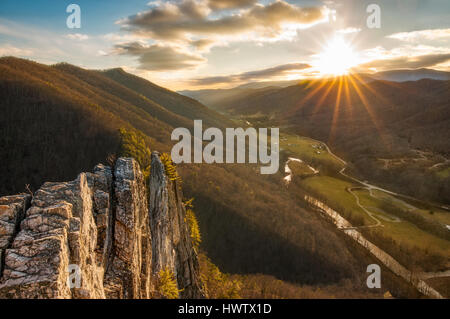 The winter sun's mask conceals the freezing temperatures of the valley, looking down from the summit of Seneca Rocks in West Virginia. Stock Photo