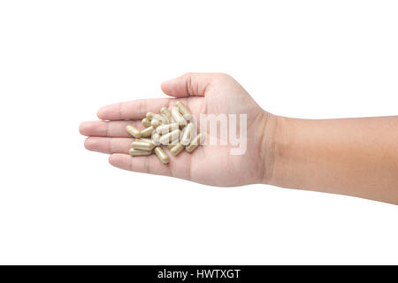 Hand holding medicine pills isolated on white with clipping path Stock Photo