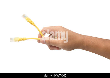 Male hand holding yellow lan cable isolated on white background with clipping path Stock Photo