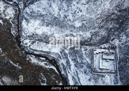 View from Wings of Tatev aerial tramway. The On photo you can find the Great Hermitage of Tatev, where lived monks. The building is 1000 years old. Stock Photo