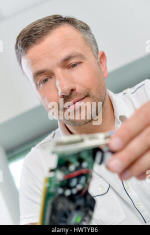 Installing a video card Stock Photo