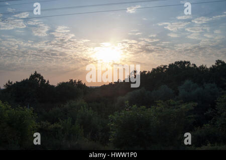Dawn in the mountains of Abkhazia against the background of the cloudy sky Stock Photo
