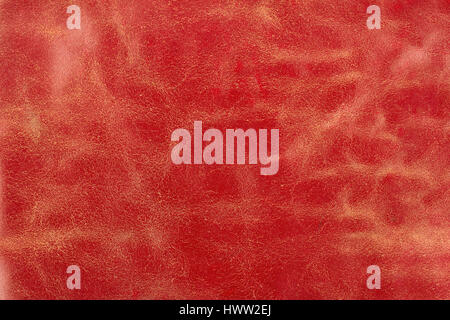 horizontal macro close up of red vintage leather texture with cracks and wrinkles Stock Photo