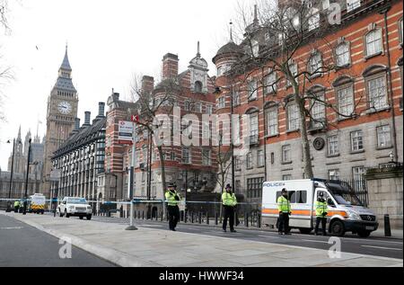 London, UK. 23rd Mar, 2017. Policemen stand guard near the Houses of Parliament in London, Britain on March 23, 2017. Credit: Han Yan/Xinhua/Alamy Live News