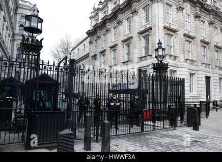 London, UK. 23rd Mar, 2017. Policemen stand guard near the 10 Downing Street in London, Britain on March 23, 2017. Credit: Han Yan/Xinhua/Alamy Live News Stock Photo