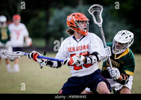 Jupiter, Florida, USA. 23rd Mar, 2017. Benjamin Buccaneers midfielder Peter Reed (23) looks to pass the ball to his teammates against Jupiter Warriors defender Kenny Cronin (29) during the first quarter at Jupiter Community Park on Thursday, Mar. 23, 2017. Credit: Michael Ares/The Palm Beach Post/ZUMA Wire/Alamy Live News Stock Photo