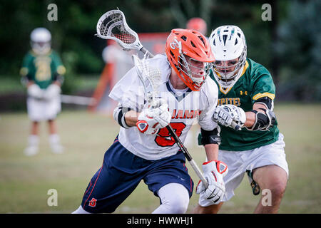 Jupiter, Florida, USA. 23rd Mar, 2017. Benjamin Buccaneers midfielder Michael Buttelman (9) runs past a Jupiter Warriors defender during the second quarter at Jupiter Community Park on Thursday, Mar. 23, 2017. Credit: Michael Ares/The Palm Beach Post/ZUMA Wire/Alamy Live News Stock Photo