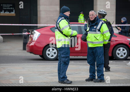 London, UK Thursday March 23, 2017 Police officers stand guard on a road leading to the Houses of Parliament in London. After the terrorist attack Credit: Elena Rostunova/Alamy Live News Stock Photo