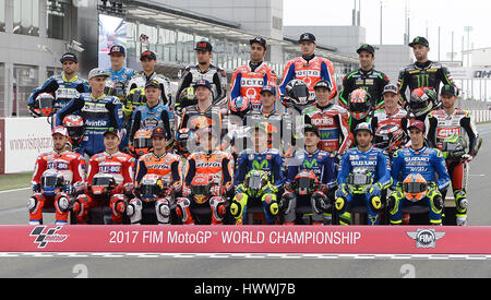 Doha, Qatar. 23rd Mar, 2017. MotoGP riders pose during a photo session before 2017 MotoGP Grand Prix of Qatar Free Practice 1 in Losail Circuit of Doha, capital of Qatar, on March 23, 2017. Credit: Nikku/Xinhua/Alamy Live News Stock Photo