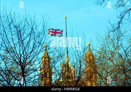 London, UK. 23rd Mar, 2017. Union flag flies at half-mast over the Houses of Parliament after terror attack. Westminster Bridge re-opens after terror attack. Credit: JOHNNY ARMSTEAD/Alamy Live News Stock Photo