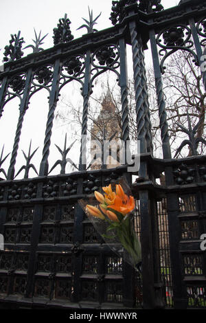 London UK.  24th March 2017. Floral tributes are placed by members of the public on Westminster Bridge after the terror attacks in Parliament Credit: amer ghazzal/Alamy Live News Stock Photo