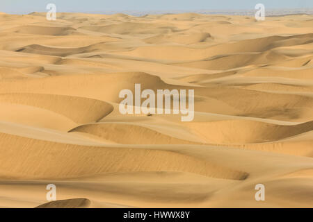 Big sand dunes panorama. Desert or beach sand textured background. Stock Photo