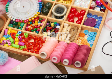 set of accessories and jewelry to embroidery, sewing accessories top view, seamstress workplace, many object for needlework, embroidery, handmade and  Stock Photo