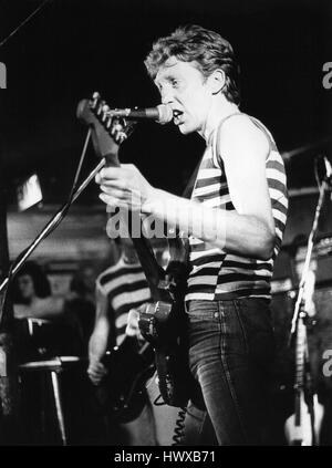 Bram Tchaikovsky (Peter Bramall) of hit rock group The Motors performs live on stage in London, England in 1978. Stock Photo