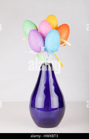 Colorful Easter bouquet on a white surface. Isolated on white background. Stock Photo