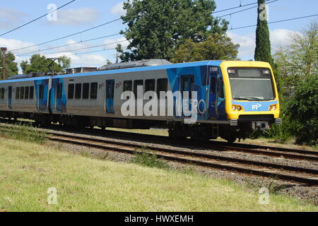 Metro Train city bound from Belgrave to Melbourne mid afternoon, Melbourne, Australia. Stock Photo