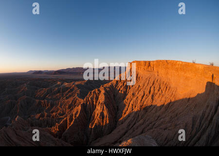 Sunrise lights the rugged cliffs of Font's Point at Anza-Borrego Desert State Park in San Diego, California. Stock Photo