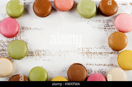 Macaroons on  white wooden background. Top view Stock Photo