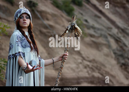 Shaman with Staff and glass ball outdoor Stock Photo