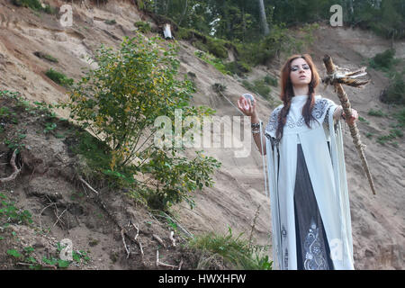 Shaman with Staff and glass ball outdoor Stock Photo