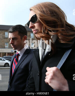 American airline pilot Paul Brady Grebenc, 35, arrives with his wife Emily, at Paisley Sheriff Court, where he and fellow pilot Carlos Roberto Licona, 45, have been released on bail and charged with being under the influence of alcohol as they prepared to fly a passenger jet from Scotland to the US. Stock Photo
