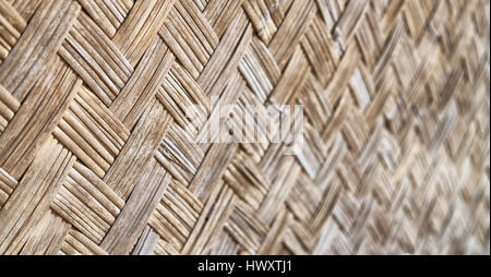 a wall build on wicker bamboo like abstract vintage surface Stock Photo