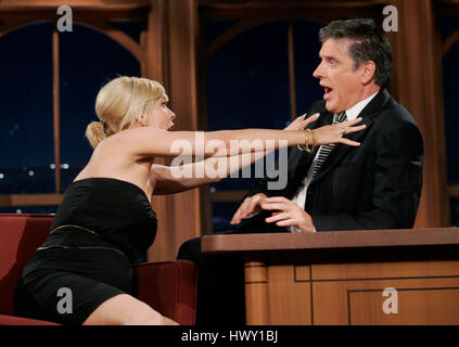 Actress Jenna Elfman, left, chats with host Craig Ferguson during a segment of the 'Late Late Show with Craig  Ferguson' at CBS Television City in Los Angeles, California on September 30, 2009. Photo by Francis Specker Stock Photo