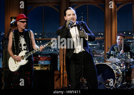 The punk band, 'The Damned' with members, Dave Vanian on lead vocals, Captain Sensible on guitar, left,  Andrew 'Pinch' Pinching on drums performs during a segment of 'The Late Late Show with Craig Ferguson' at CBS Television City in Los Angeles on Thursday, Oct. 30, 2008. Photo by Francis Specker Stock Photo