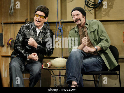 Host Craig Ferguson, left, as Bono, Philip McGrade, center, as the Edge ...