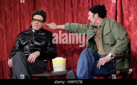 Host Craig Ferguson, left, as Bono, Philip McGrade, center, as the Edge ...