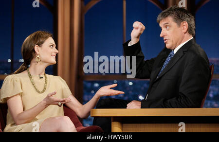 Actress Emily Deschanel, left, chats with host Craig Ferguson during a segment of 'The Late Late Show with Craig Ferguson' at CBS Television City on April 29, 2008 in Los Angeles, California. Photo by Francis Specker Stock Photo